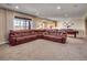 Spacious recreation room with a large sectional, and pool table at 6450 S Riverwood Ct, Aurora, CO 80016