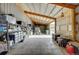 Inside spacious barn, featuring high ceilings, ample storage, and large open area at 810 N Perry Park Rd, Sedalia, CO 80135