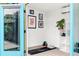 Versatile backyard workspace featuring fitness space with yoga mat and exercise equipment at 2525 S Meade St, Denver, CO 80219