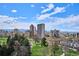 Scenic view of the city skyline with lush green trees, and blue sky at 1223 Race St # 605, Denver, CO 80206