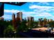 A scenic view of the city skyline surrounded by vibrant autumn foliage at 1223 Race St # 605, Denver, CO 80206