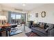 Home office with work area, balcony access and comfortable lounge area at 1223 Race St # 605, Denver, CO 80206