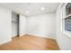 Light and airy bedroom with hardwood floors and a sliding door closet at 9663 Meade Ct, Westminster, CO 80031