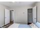 Bedroom with a ceiling fan and a closet with bi-fold doors at 1925 S Irving St, Denver, CO 80219