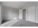 Spacious bedroom with grey carpet and double door closet at 155 S Sable Blvd # S26, Aurora, CO 80012