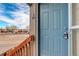 Front door entrance with a keypad lock and view of the street at 155 S Sable Blvd # S26, Aurora, CO 80012