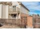 Backyard view of townhome with wooden fence at 155 S Sable Blvd # S26, Aurora, CO 80012