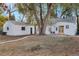 Spacious backyard with detached garage and mature trees at 3545 W Custer Pl, Denver, CO 80219