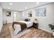 Spacious bedroom with a cozy bed and plenty of natural light at 3545 W Custer Pl, Denver, CO 80219