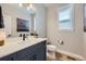 Stylish bathroom with modern fixtures, a sleek vanity, and ample lighting at 21261 E 60Th Ave, Aurora, CO 80019