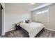 Comfortable bedroom with a plush bed, soft lighting, and neutral décor, creating a relaxing atmosphere at 21261 E 60Th Ave, Aurora, CO 80019