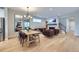 Inviting living room with a dining area and comfortable seating, perfect for entertaining guests at 21261 E 60Th Ave, Aurora, CO 80019