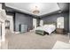 The main bedroom offers ample space, neutral carpet, and an ensuite bathroom at 648 Ruby Trust Dr, Castle Rock, CO 80108