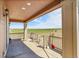 Enjoy the outdoors from this shaded back porch with views of the surrounding landscape at 49346 E County Road 6, Bennett, CO 80102