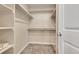 Walk-in closet with plenty of shelving for optimal storage at 49346 E County Road 6, Bennett, CO 80102