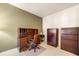 Home office setup with a desk, chair, and storage cabinets at 10915 Acadia Ln, Parker, CO 80138
