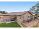 Backyard view showcases a well-maintained lawn, wooden deck, hot tub and an outdoor entertainment area at 20243 High Pines Dr, Monument, CO 80132