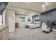 Comfortable bedroom with accent wall, tv, game chair, and ample space at 20243 High Pines Dr, Monument, CO 80132