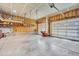 The spacious garage features built-in shelving and plenty of room for storage at 20243 High Pines Dr, Monument, CO 80132