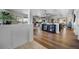 Inviting open-concept living space with hardwood floors and lots of natural light at 20243 High Pines Dr, Monument, CO 80132