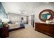 Comfortable main bedroom featuring ample space, a barn door, and relaxing decor at 20243 High Pines Dr, Monument, CO 80132