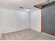 Unfinished basement featuring carpet, white walls and ceiling light at 12104 Ivanhoe Ct, Brighton, CO 80602