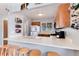 Spacious kitchen with breakfast bar and stools, providing a casual dining option and additional counter space at 12104 Ivanhoe Ct, Brighton, CO 80602