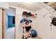 Small storage room with wire shelving and view to blue accent wall at 12104 Ivanhoe Ct, Brighton, CO 80602