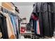 Spacious walk-in closet with ample shelving and hanging space for clothes and shoes at 12104 Ivanhoe Ct, Brighton, CO 80602