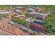 Charming aerial view of commercial buildings, neighborhood street, and surrounding cityscape at 5614 Yarrow St, Arvada, CO 80002