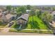 Aerial view of the home with large grassy front yard at 5614 Yarrow St, Arvada, CO 80002