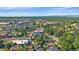Expansive aerial view of the neighborhood with city views and lush greenery at 5614 Yarrow St, Arvada, CO 80002