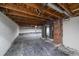 Unfinished basement with exposed beams and mechanical features at 5614 Yarrow St, Arvada, CO 80002