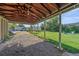 Covered carport with open beams provides ample parking and backyard access at 5614 Yarrow St, Arvada, CO 80002