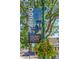 Charming street with a vintage style street light. Banner reads: Drink in Olde Town Arvada at 5614 Yarrow St, Arvada, CO 80002
