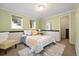 Cozy basement bedroom with queen bed and neutral decor at 16587 W 53Rd Way, Golden, CO 80403