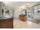 Main bathroom with double vanities, granite countertops and a view to the bedroom at 16587 W 53Rd Way, Golden, CO 80403