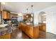 Modern kitchen with an island, stainless steel appliances, and granite counters at 16587 W 53Rd Way, Golden, CO 80403