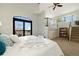 Main bedroom with high ceilings, private deck access, and loft area at 16587 W 53Rd Way, Golden, CO 80403