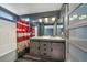 Bathroom features modern fixtures, including a beautiful vanity with double sinks, barn door and a shower/tub at 2404 S Genoa Way, Aurora, CO 80013