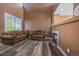 Inviting living room with stylish furnishings, a fireplace, and ample natural light at 2404 S Genoa Way, Aurora, CO 80013