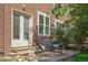 Backyard patio with outdoor seating and stone steps, offering a relaxing outdoor space at 4632 14Th St, Boulder, CO 80304