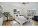 Bright bedroom with a vaulted ceiling and large windows at 4632 14Th St, Boulder, CO 80304