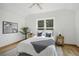 Bedroom features a vaulted ceiling, large windows and neutral paint at 4632 14Th St, Boulder, CO 80304