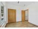 Bright bedroom features hardwood floors, neutral walls, and closet space at 4632 14Th St, Boulder, CO 80304