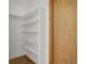 Walk in closet with custom shelving and wood trim at 4632 14Th St, Boulder, CO 80304