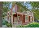 Exterior view showcasing the charming home's front porch and curb appeal at 4632 14Th St, Boulder, CO 80304