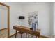 Home office features a modern desk, art, and a contemporary lamp at 4632 14Th St, Boulder, CO 80304