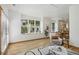 Inviting living area with large windows, light wood floors, and stylish furniture arrangements at 4632 14Th St, Boulder, CO 80304