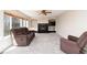 Inviting living room with a fireplace and large windows for natural light at 9265 Roadrunner St, Highlands Ranch, CO 80129